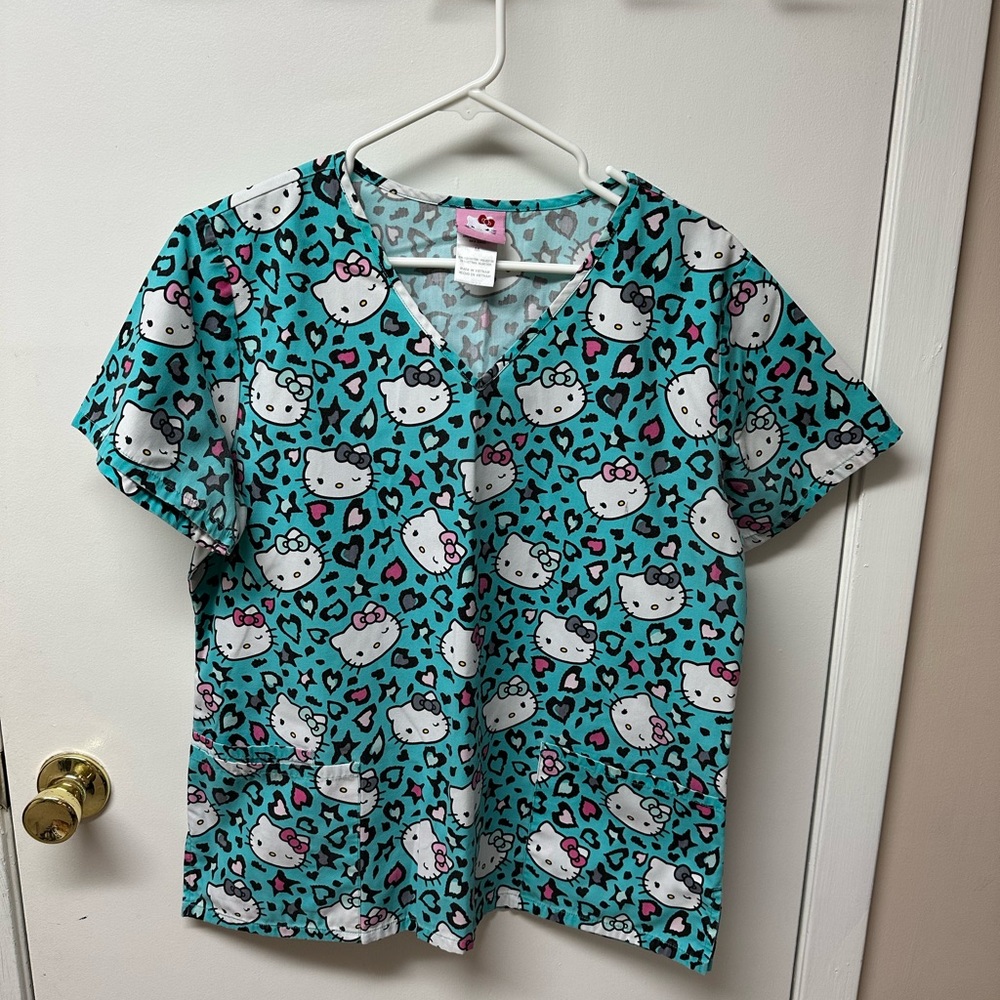 Women’s scrub top, excellent condition.